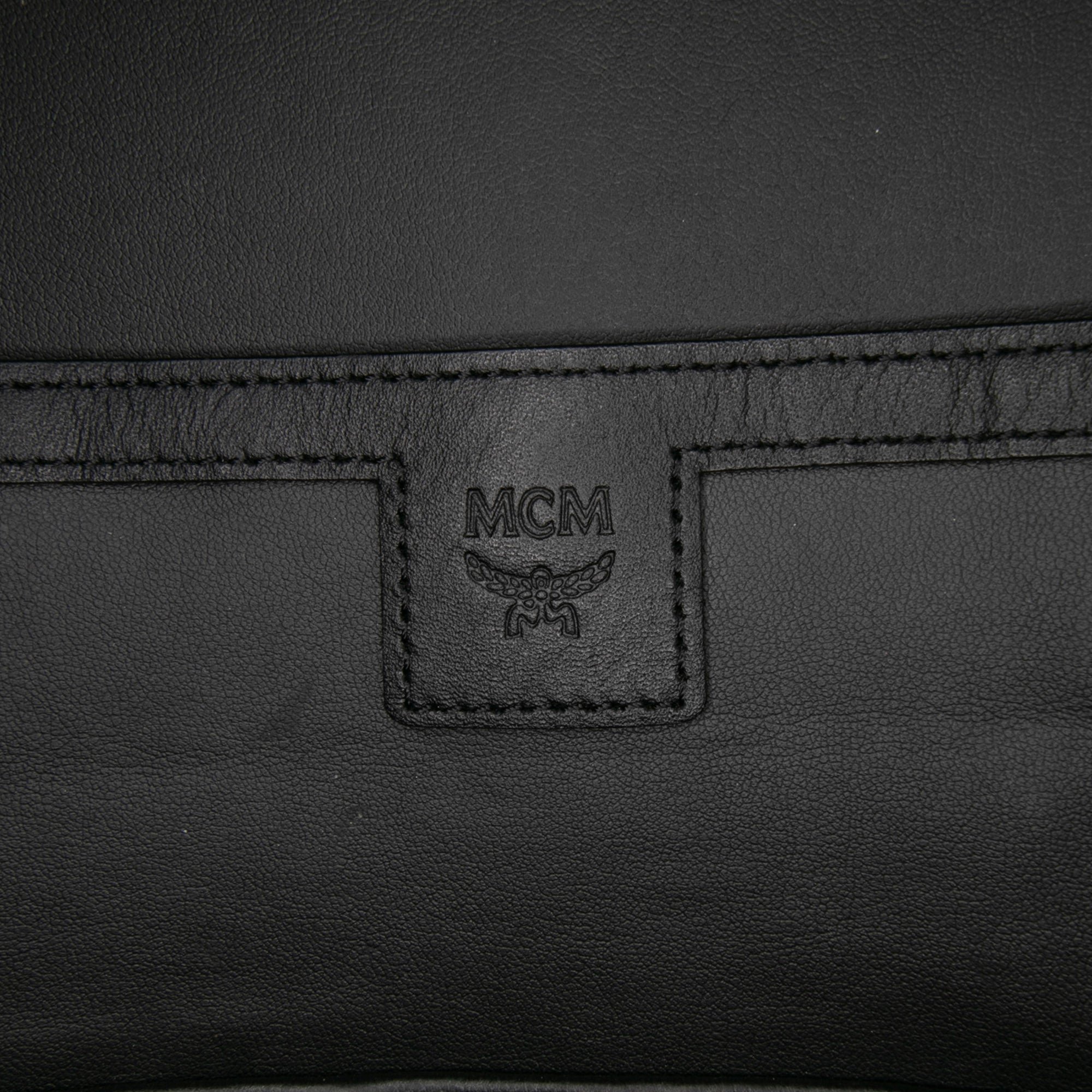 Medium Visetos Leather Stark MCmotor Backpack