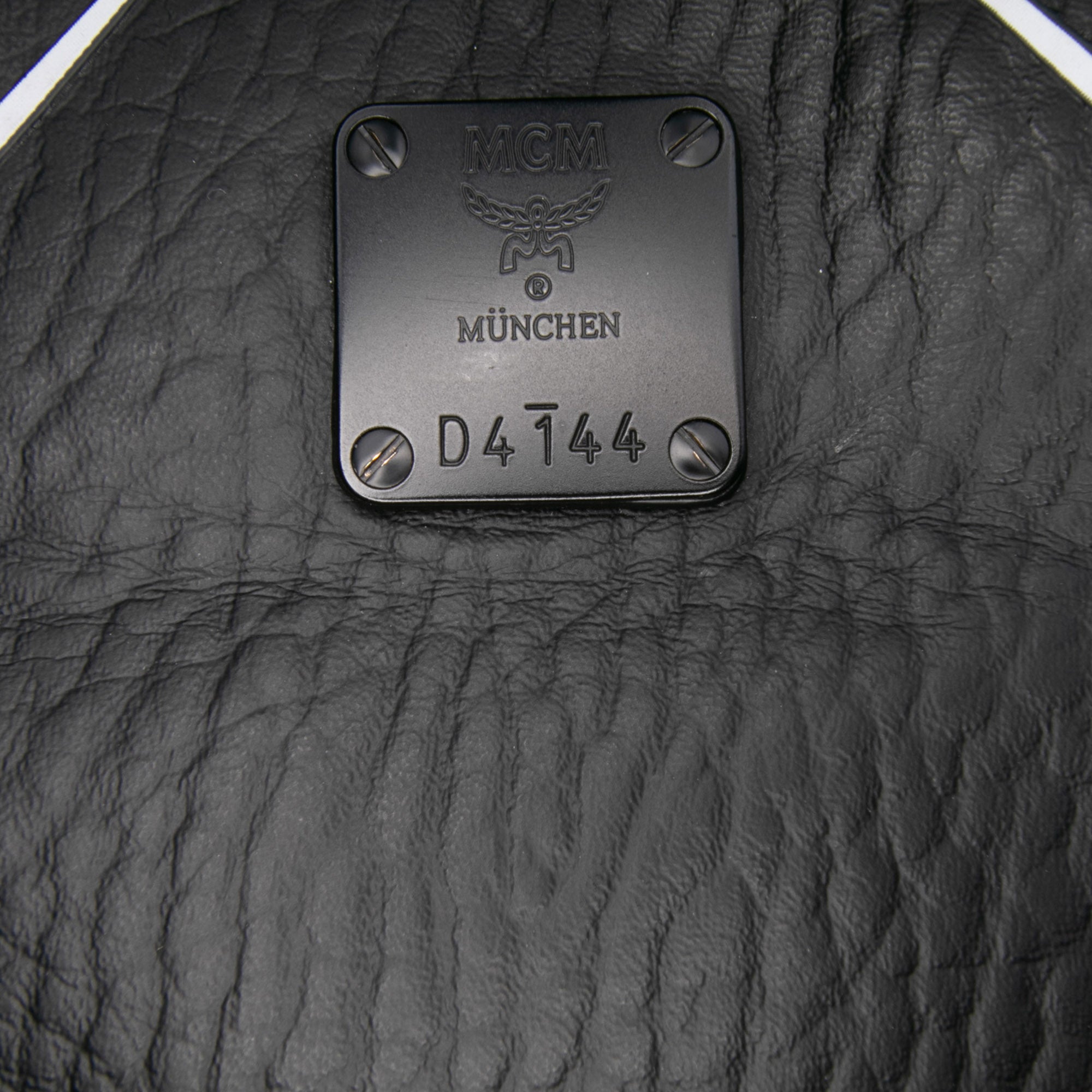 Medium Visetos Leather Stark MCmotor Backpack
