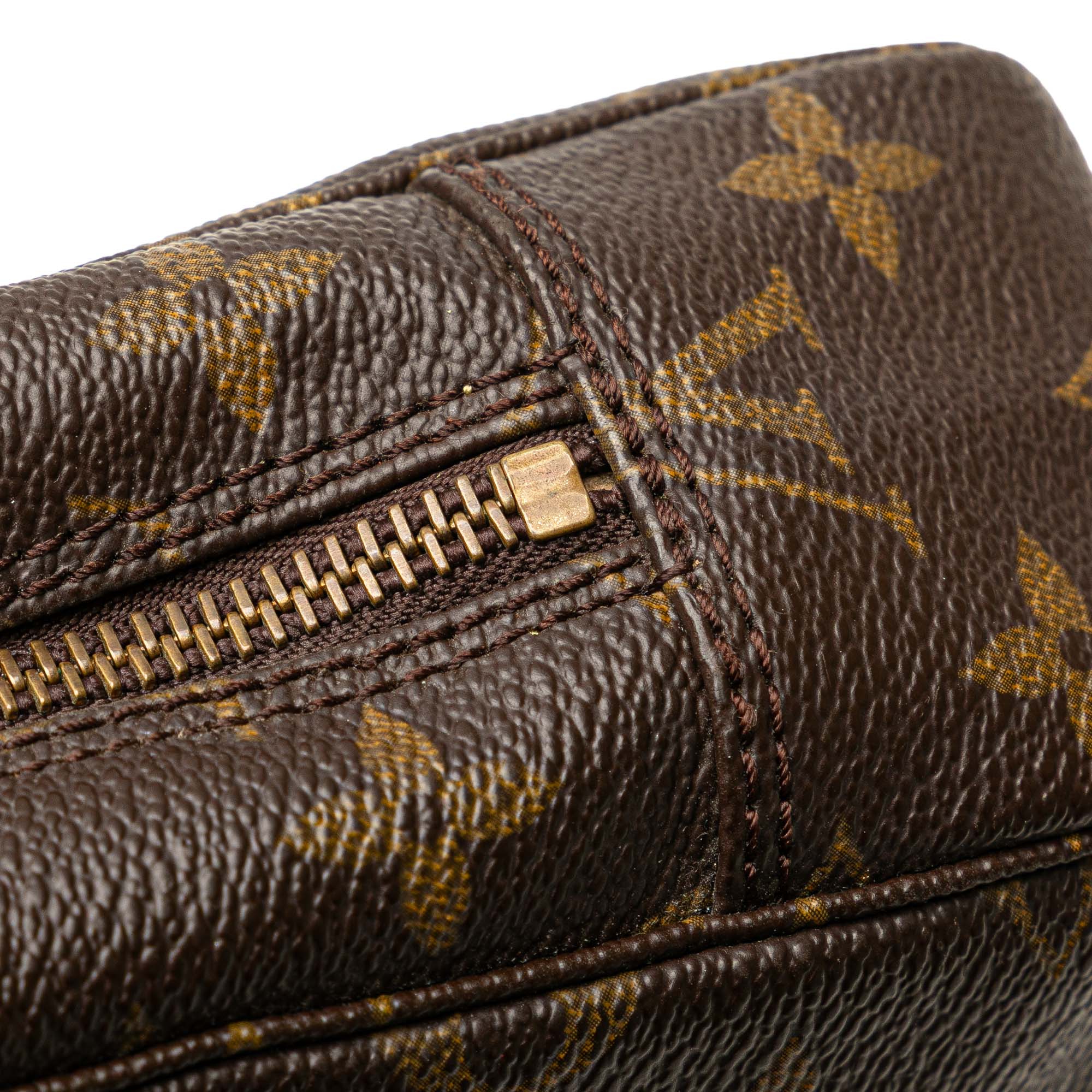 Monogram Trousse Toilette 23