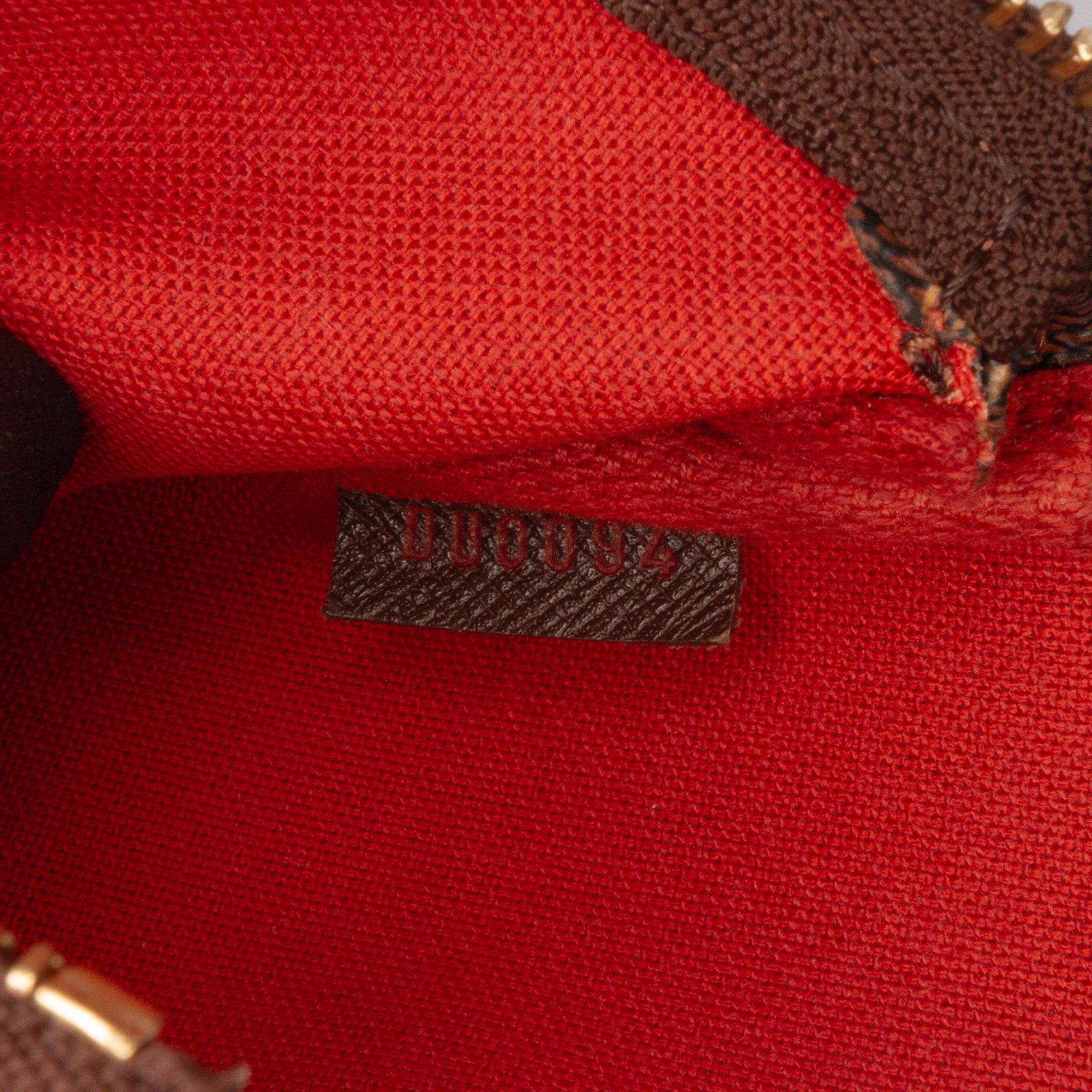 Damier Ebene Mini Pochette Accessoires