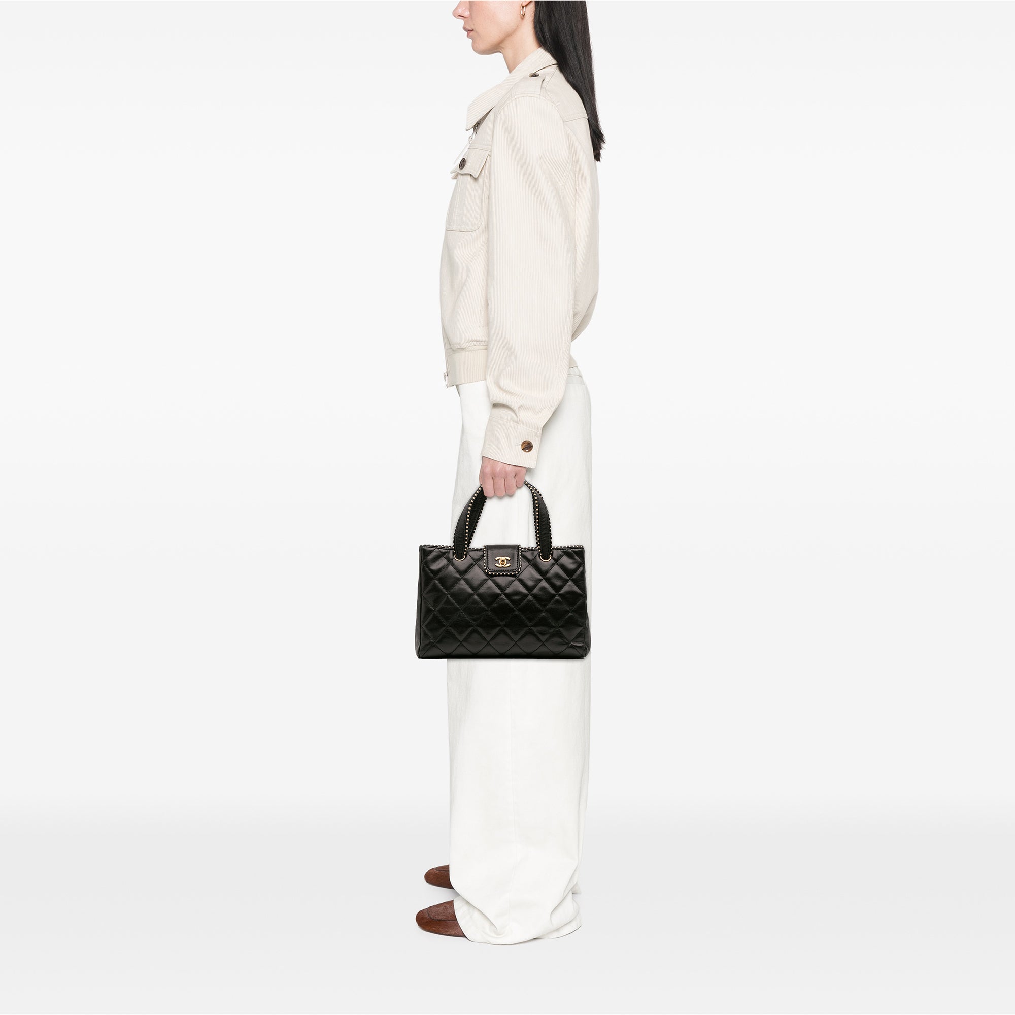 CC Quilted Lambskin Handbag