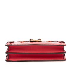 Monogram Vernis Trunk Clutch