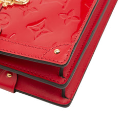 Monogram Vernis Trunk Clutch