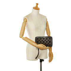 Monogram Tuffetage Soft Trunk Clutch