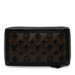 Monogram Tuffetage Soft Trunk Clutch