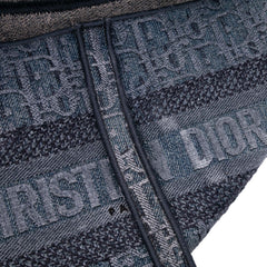 Oblique Embroidered Denim Saddle Bag