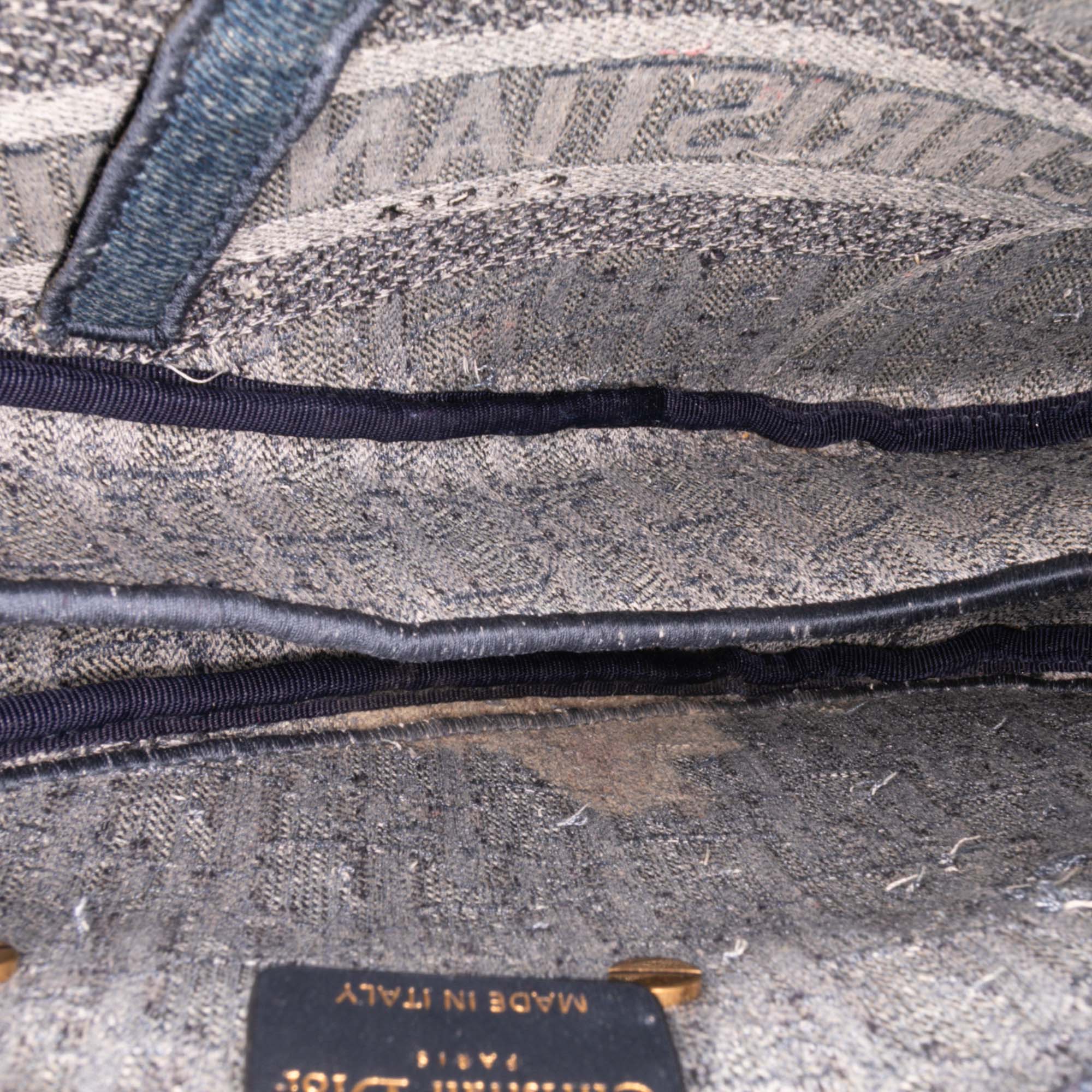 Oblique Embroidered Denim Saddle Bag