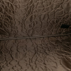 Large CC Embossed Lambskin Camellia O Case Clutch