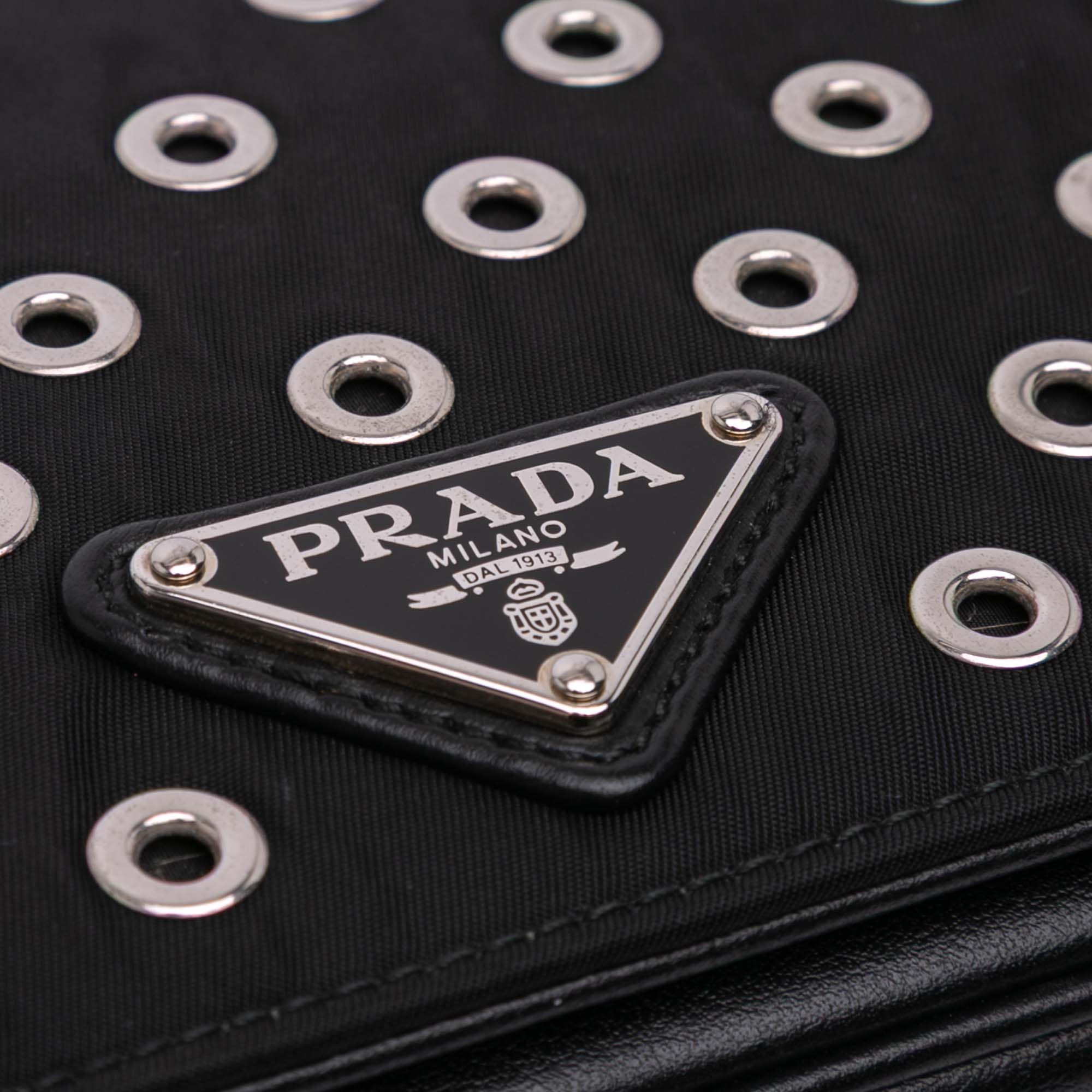Tessuto Grommet Crossbody