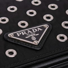 Tessuto Grommet Crossbody