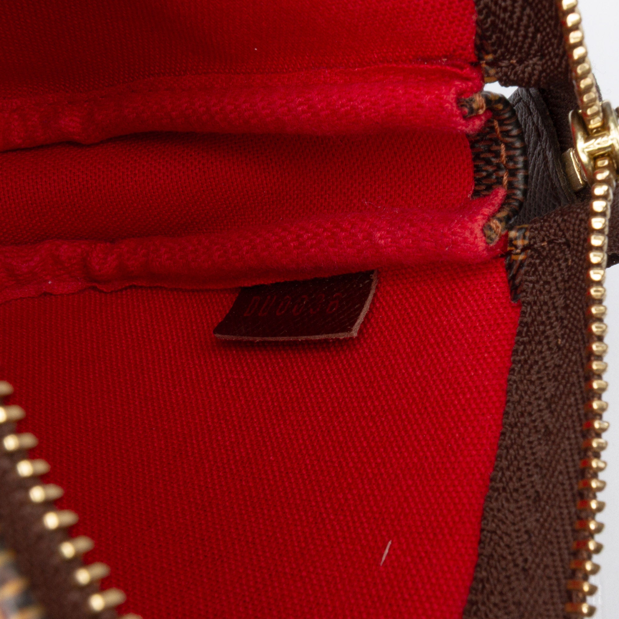 Damier Ebene Mini Pochette Accessoires