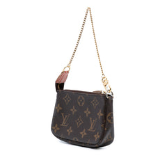 Monogram Trunks and Locks Mini Pochette Accessoires