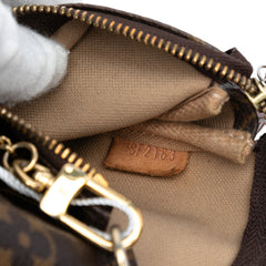 Monogram Trunks and Locks Mini Pochette Accessoires