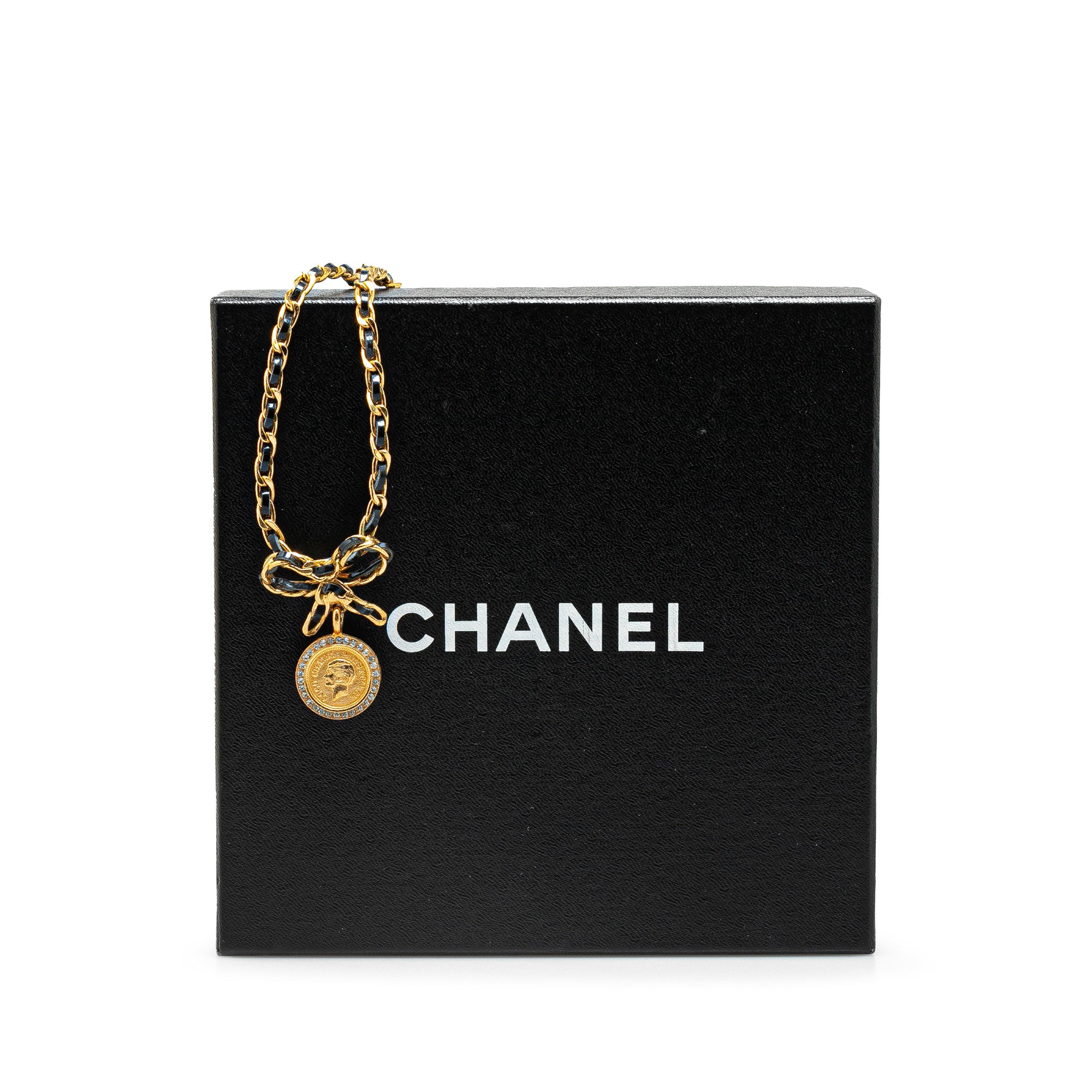 Leather and Gold Plated Medallion Bow Pendant Necklace