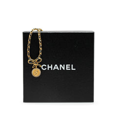 Leather and Gold Plated Medallion Bow Pendant Necklace