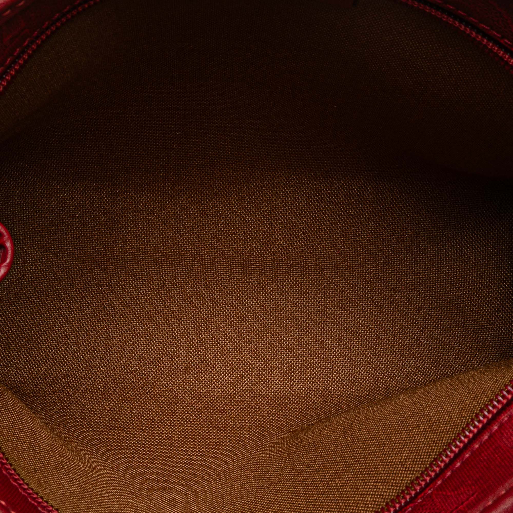 Diorissimo Trotter Coated Canvas Clutch