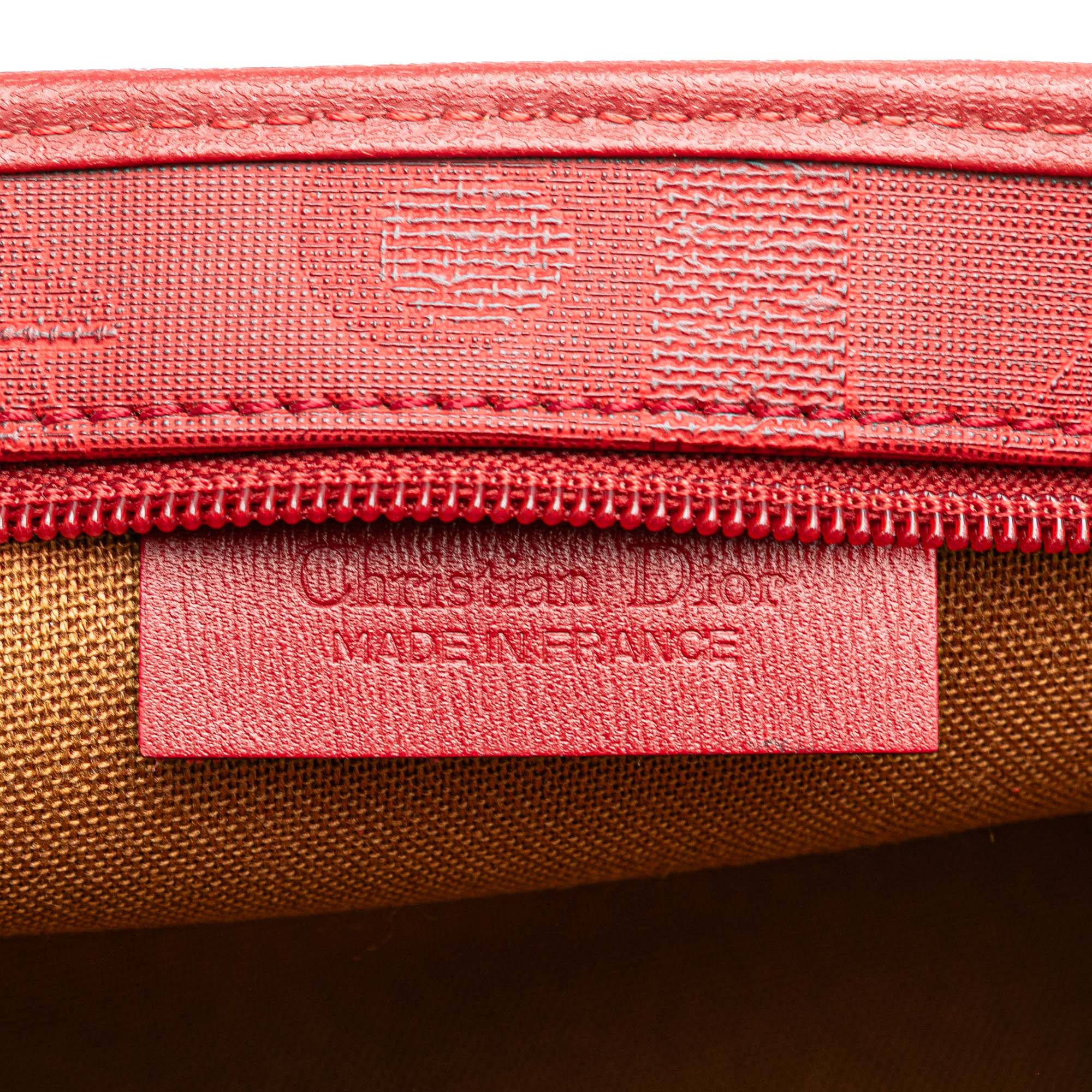 Diorissimo Trotter Coated Canvas Clutch