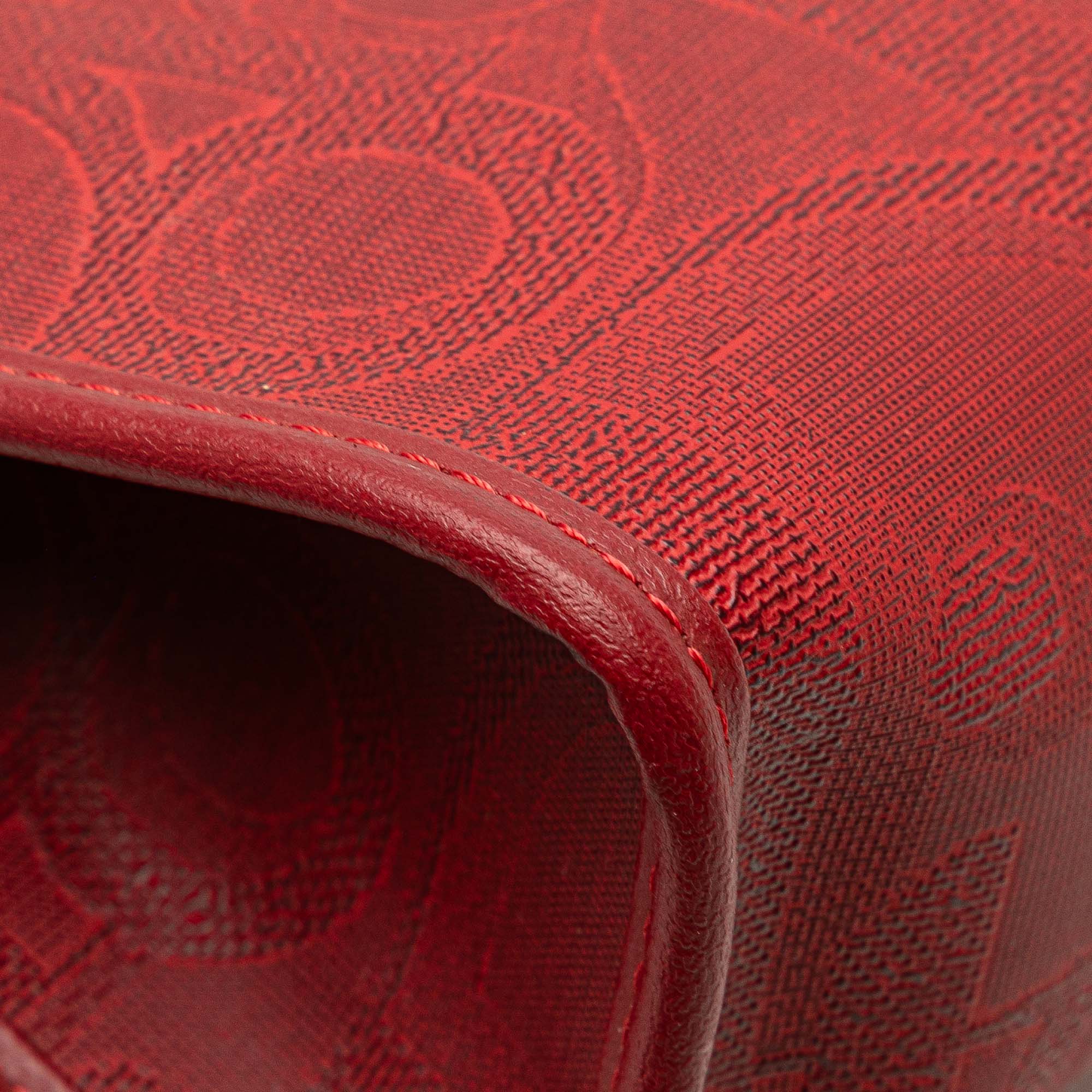 Diorissimo Trotter Coated Canvas Clutch