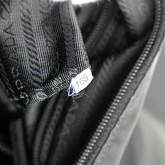 Tessuto Zip Top Crossbody