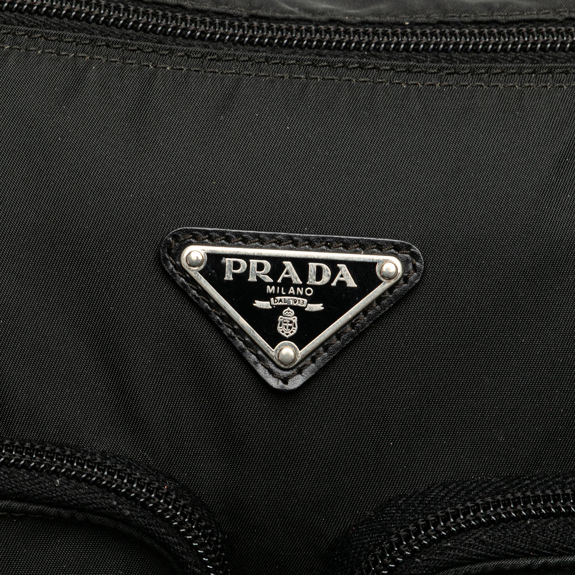 Tessuto Zip Top Crossbody