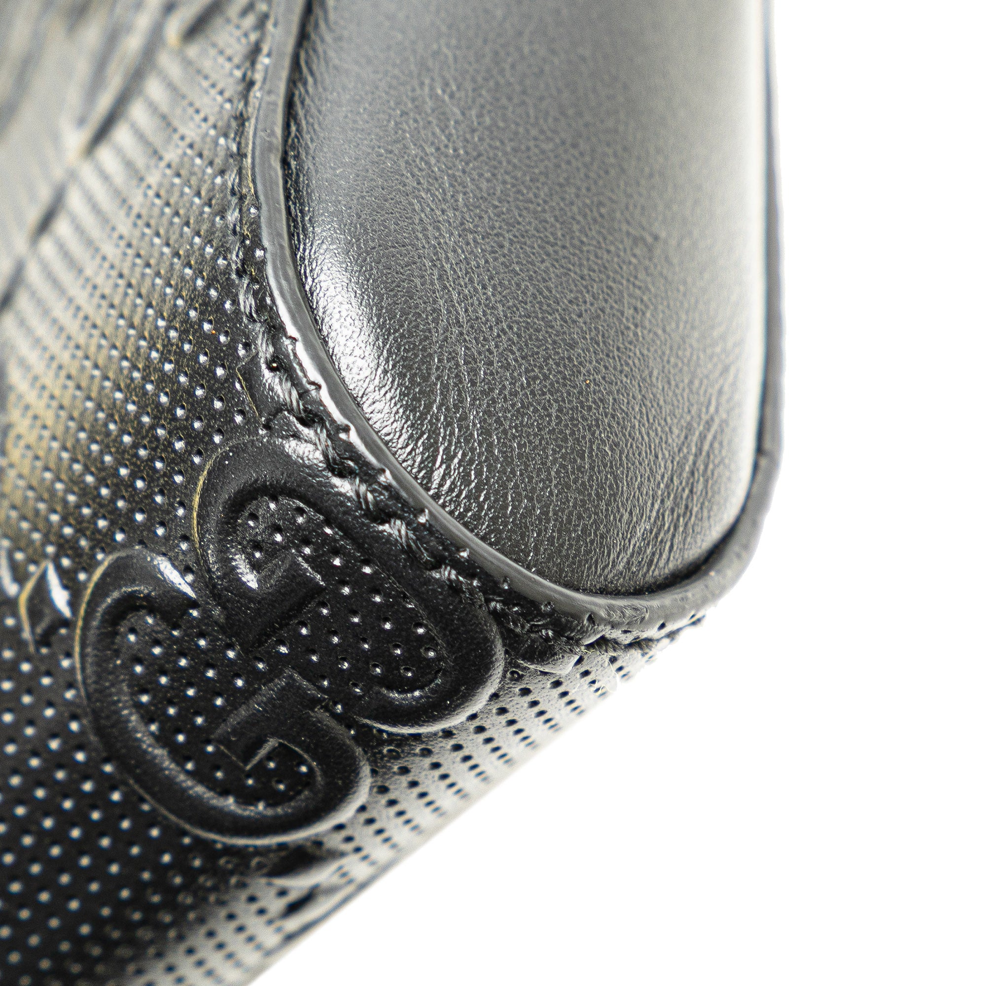 GG Embossed Perforated Double Belt Bag