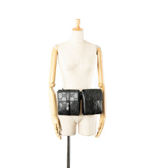 GG Embossed Perforated Double Belt Bag