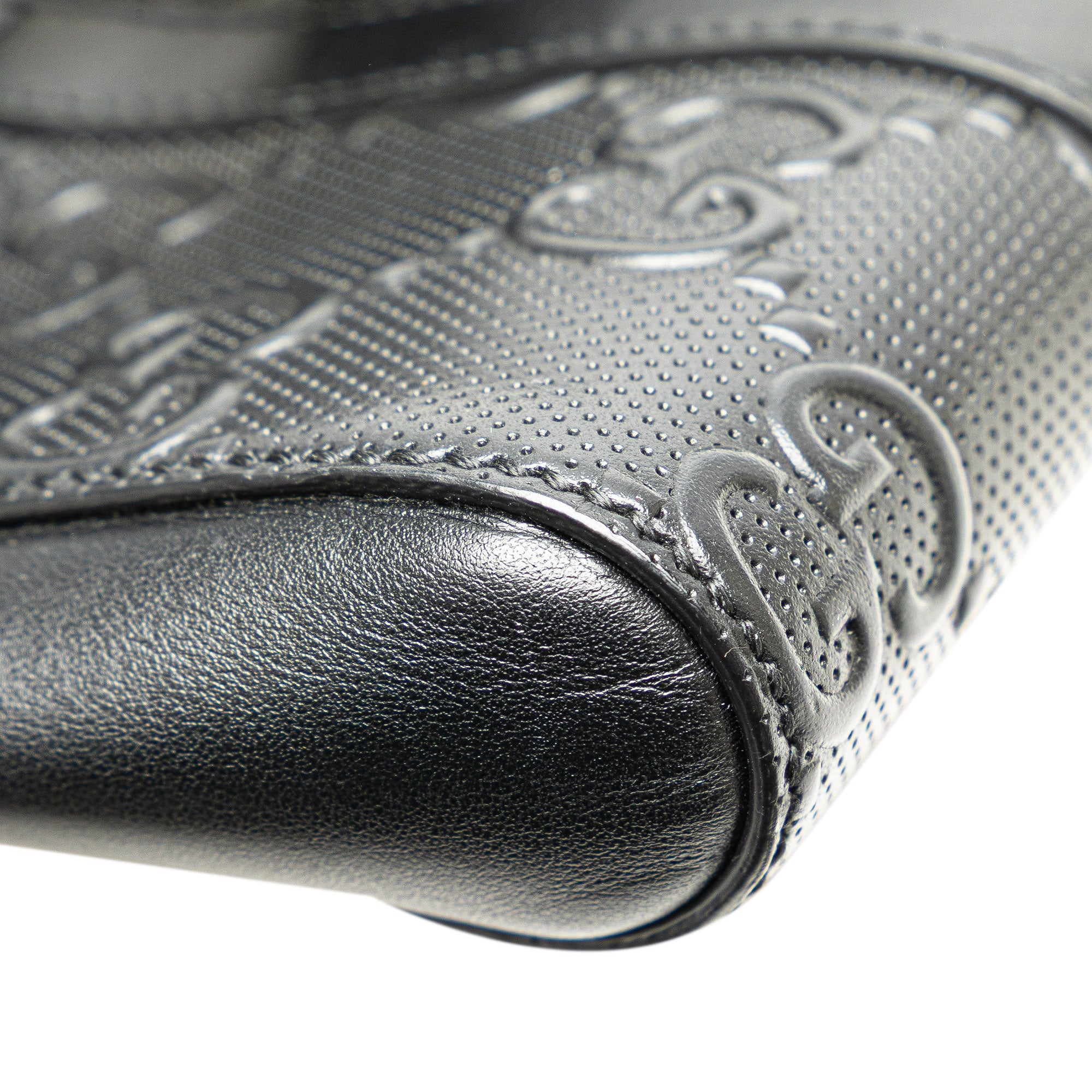 GG Embossed Perforated Double Belt Bag