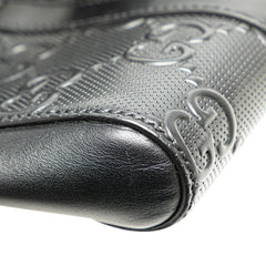 GG Embossed Perforated Double Belt Bag