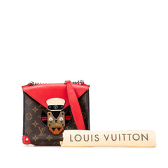 Monogram Tribal Mask Pochette PM