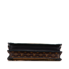 Monogram Reverse Trunk Clutch