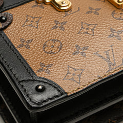 Monogram Reverse Trunk Clutch