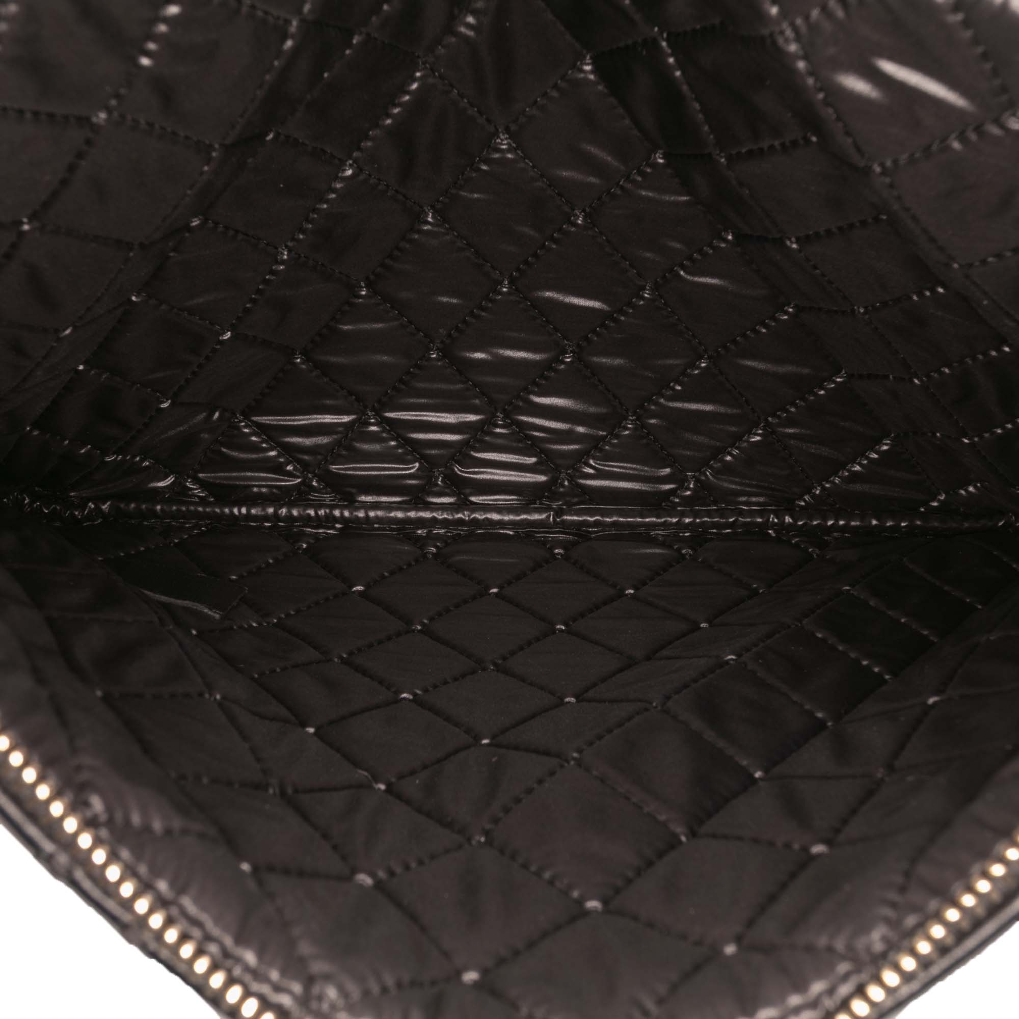 Medium Quilted Lambskin Double Stitch Tassel O Case Clutch