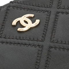 Medium Quilted Lambskin Double Stitch Tassel O Case Clutch