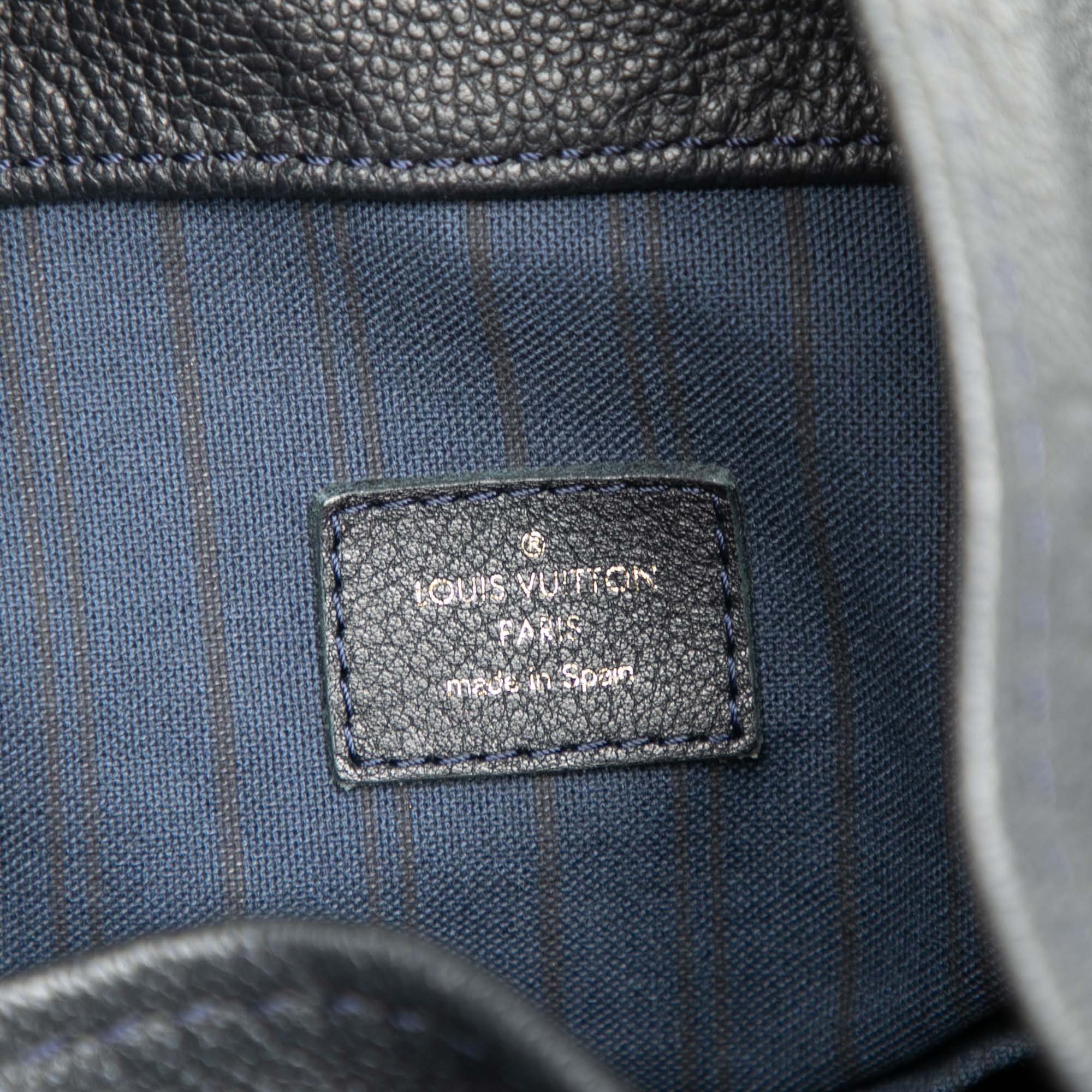 Monogram Empreinte Artsy MM