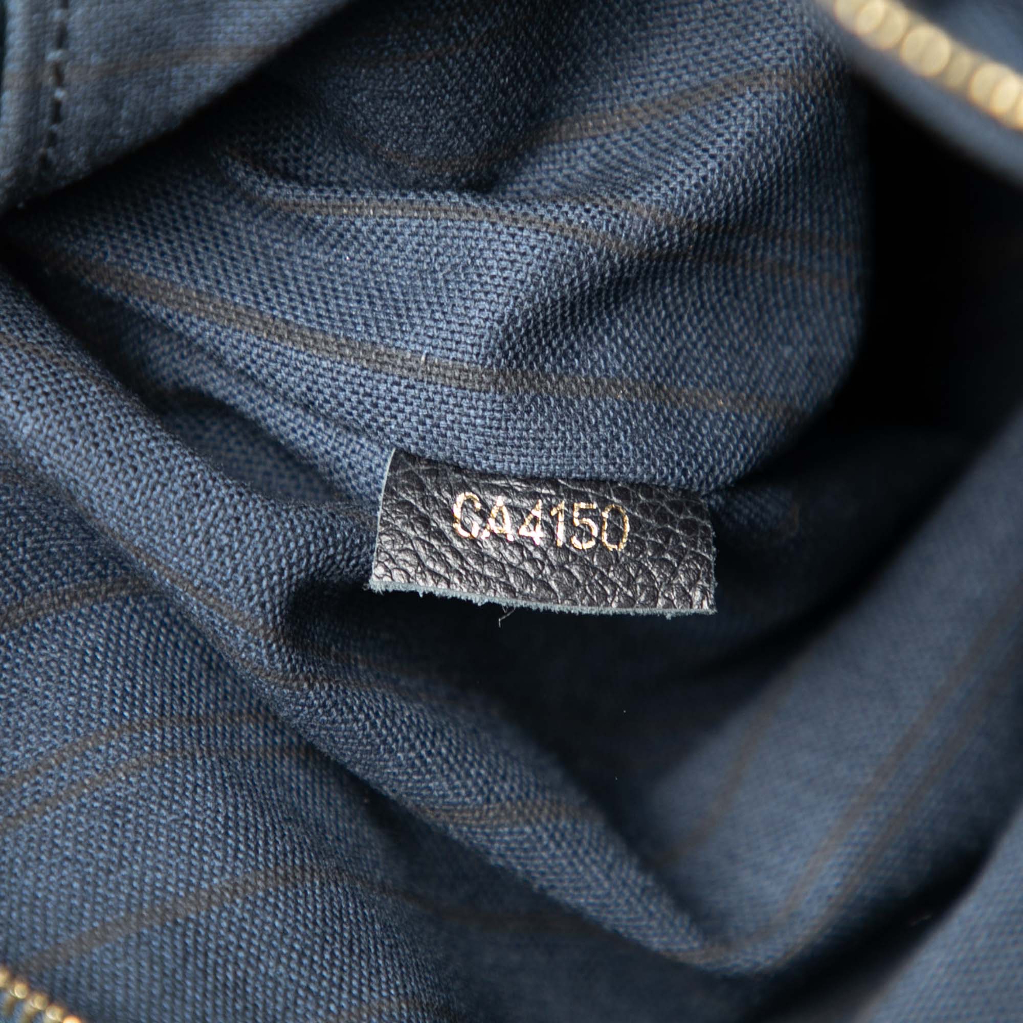 Monogram Empreinte Artsy MM