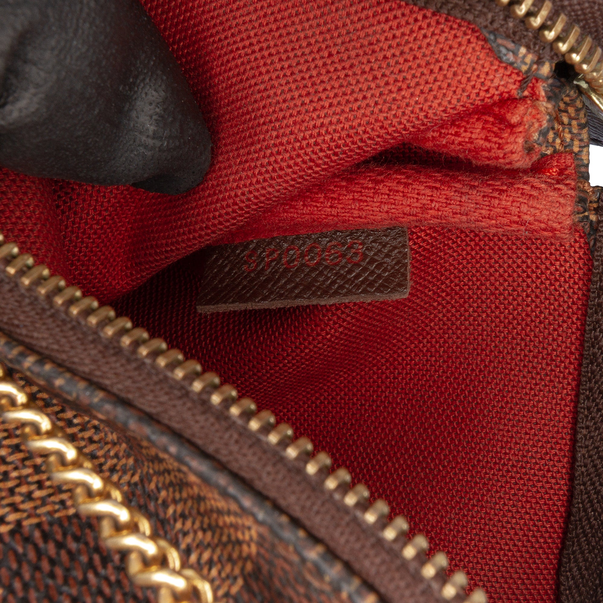 Damier Ebene Mini Pochette Accessoires