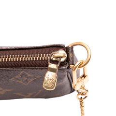 Monogram Trunks and Bags Mini Pochette Accessoires