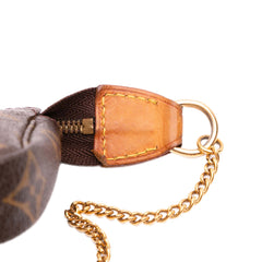 Monogram Trunks and Bags Mini Pochette Accessoires