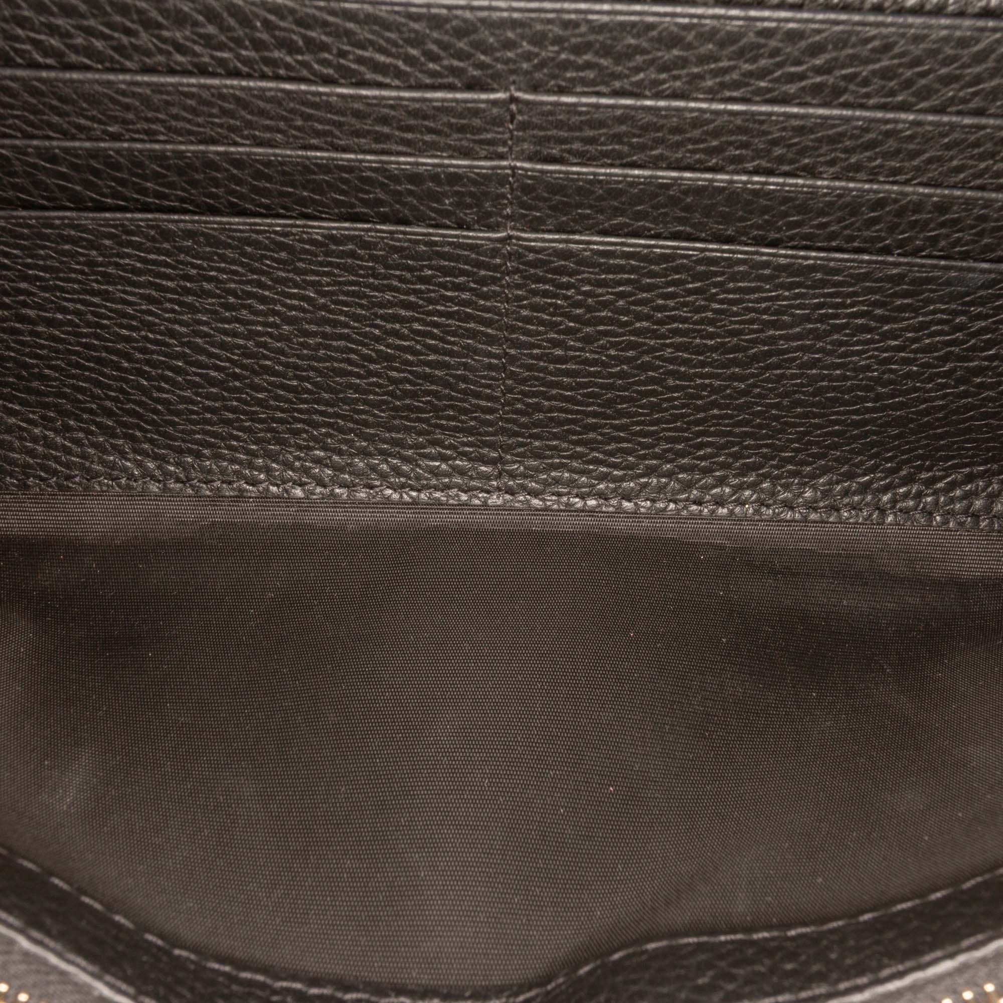 Pebbled Calfskin Rockstud Flip Lock Wallet On Chain