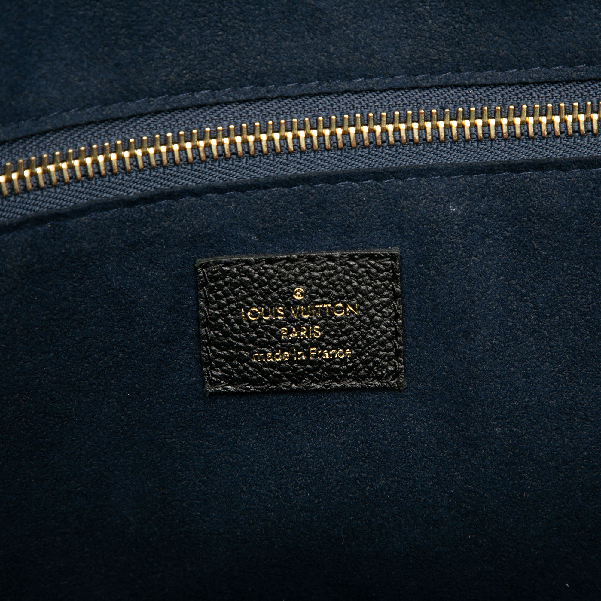 Monogram Giant Empreinte Neverfull MM