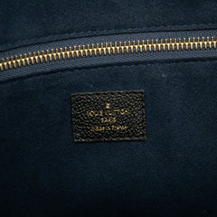 Monogram Giant Empreinte Neverfull MM