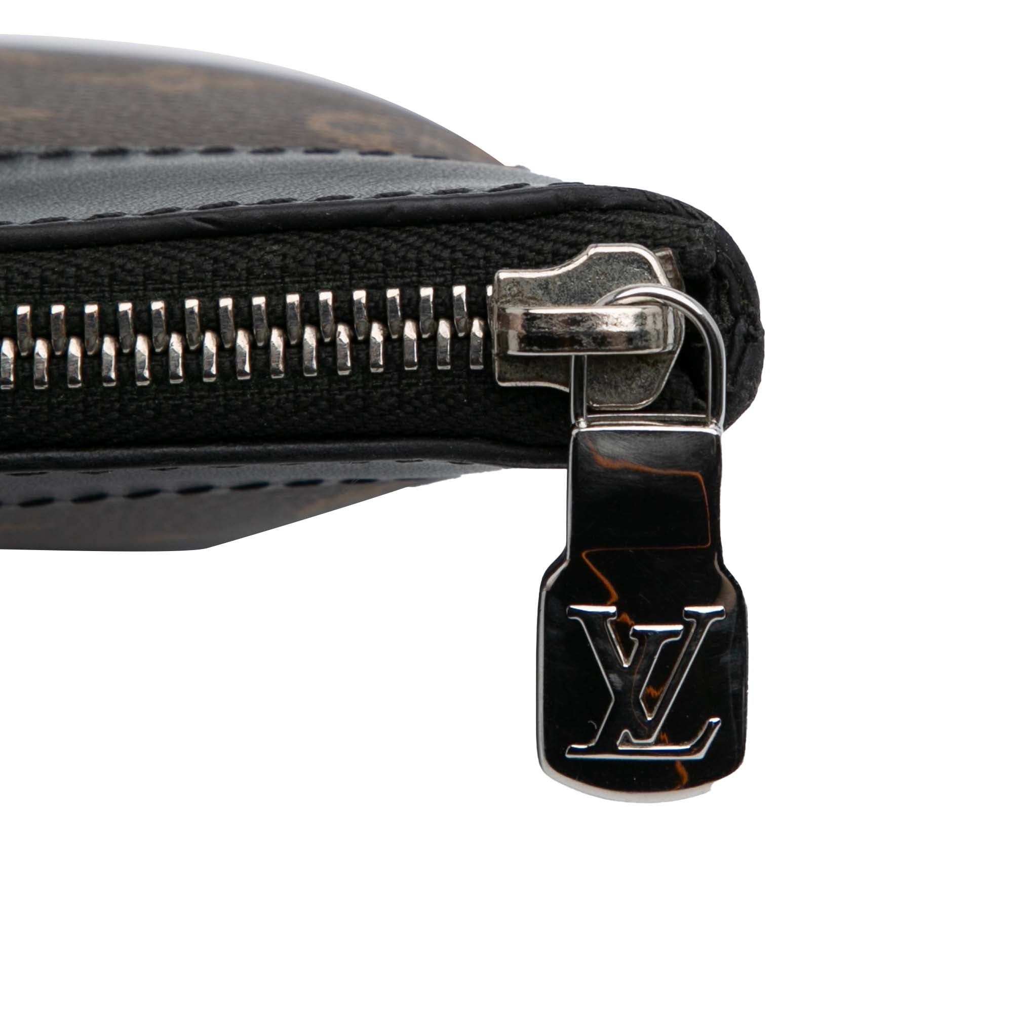 Monogram Macassar Discovery Pochette GM