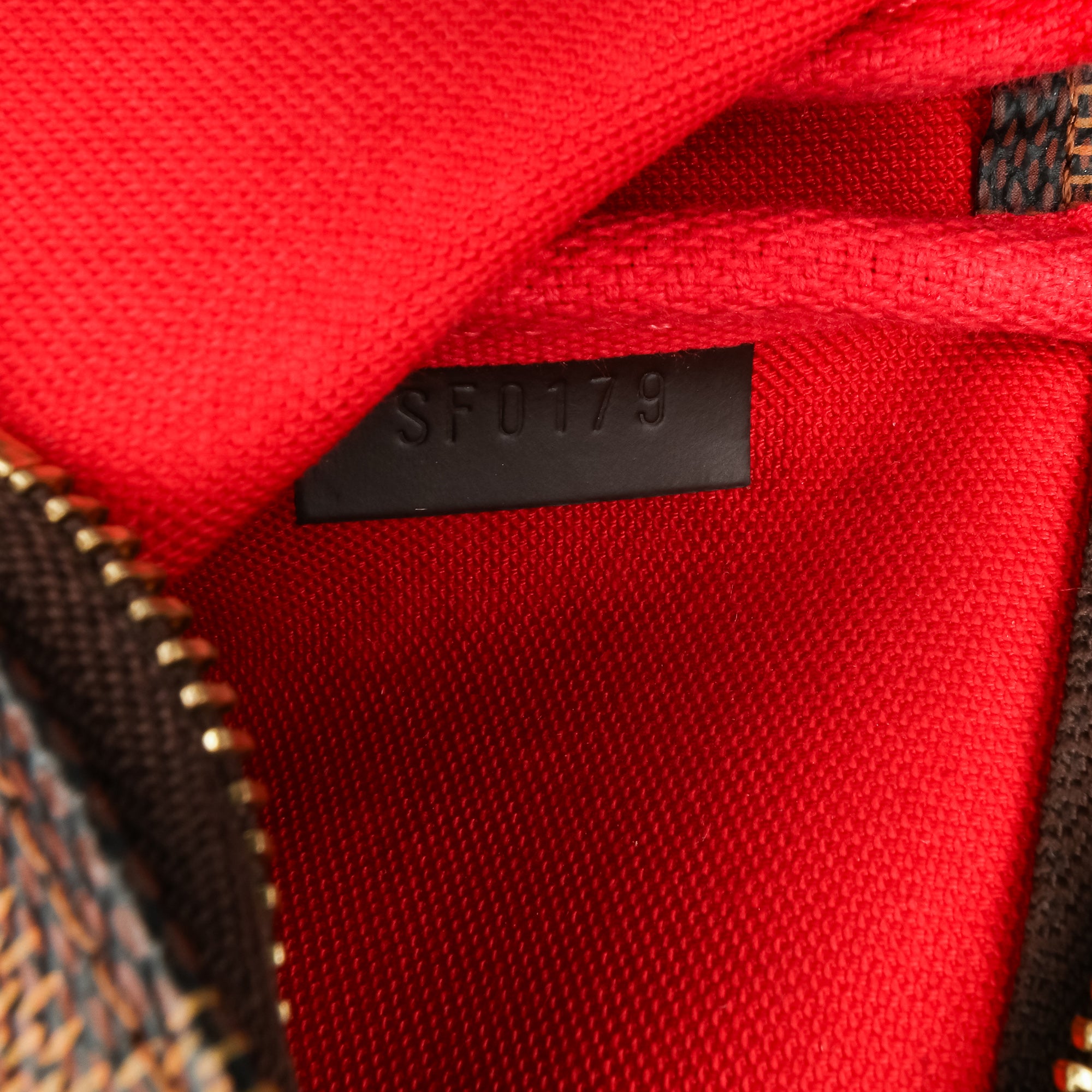 Damier Ebene Mini Pochette Accessoires