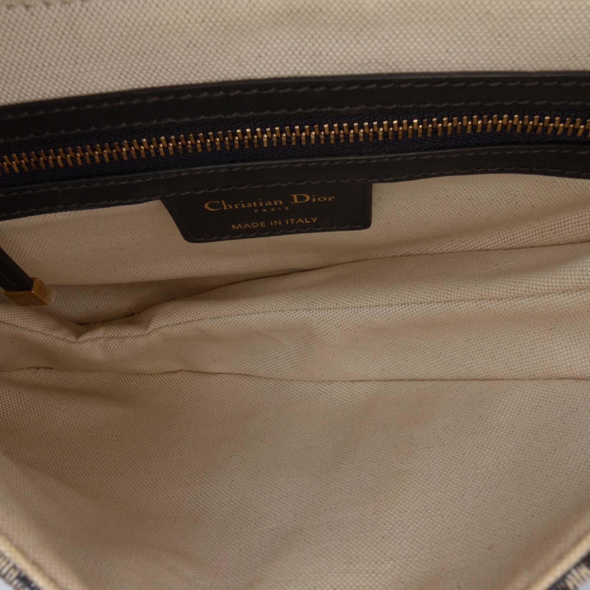 Oblique Canvas Saddle Bag