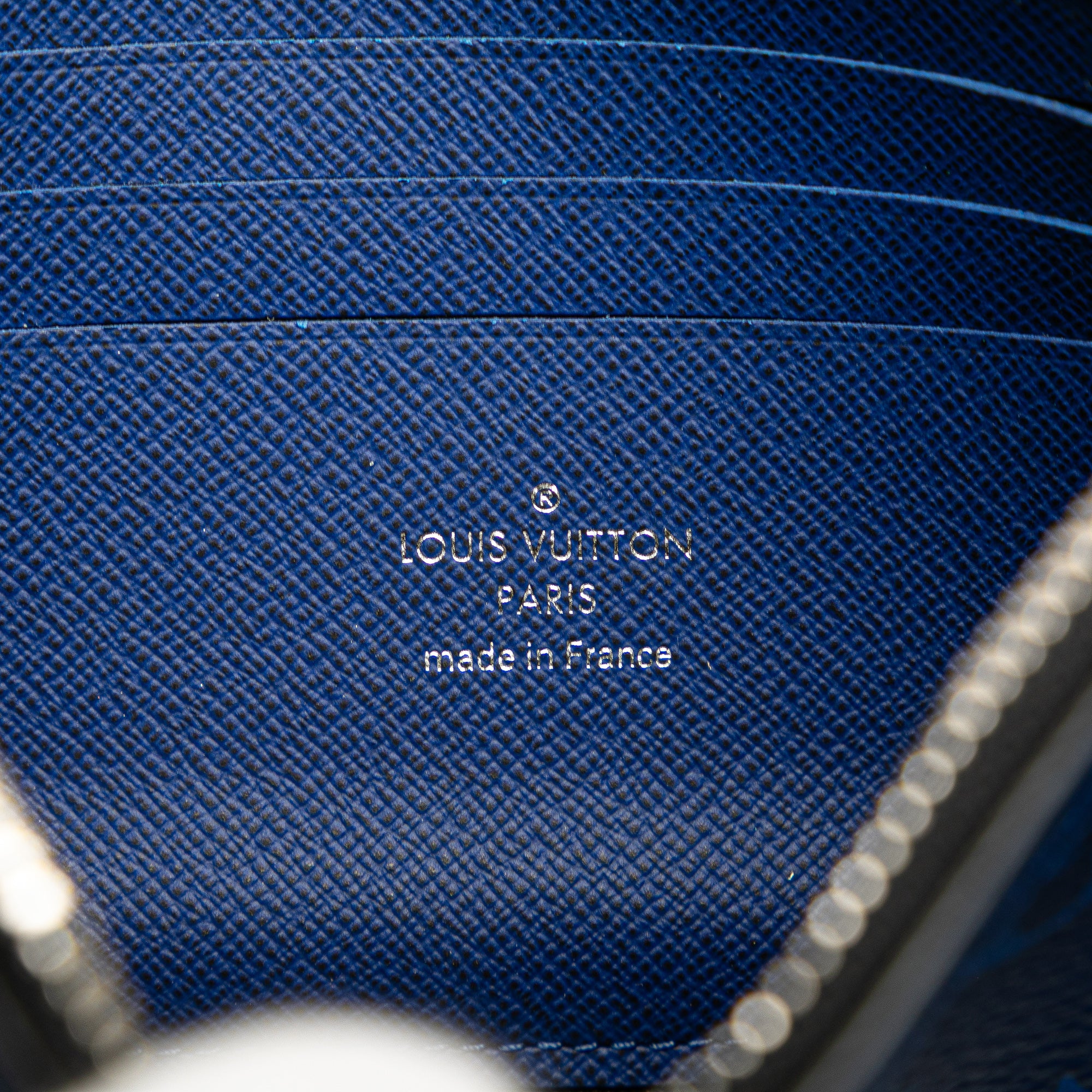 Monogram Taigarama Pochette Discovery PM