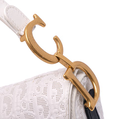 Perforated Oblique Embossed Calfskin Saddle Bag