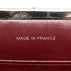 CC Quilted Lambskin Kiss Lock Frame Top Handle Bag