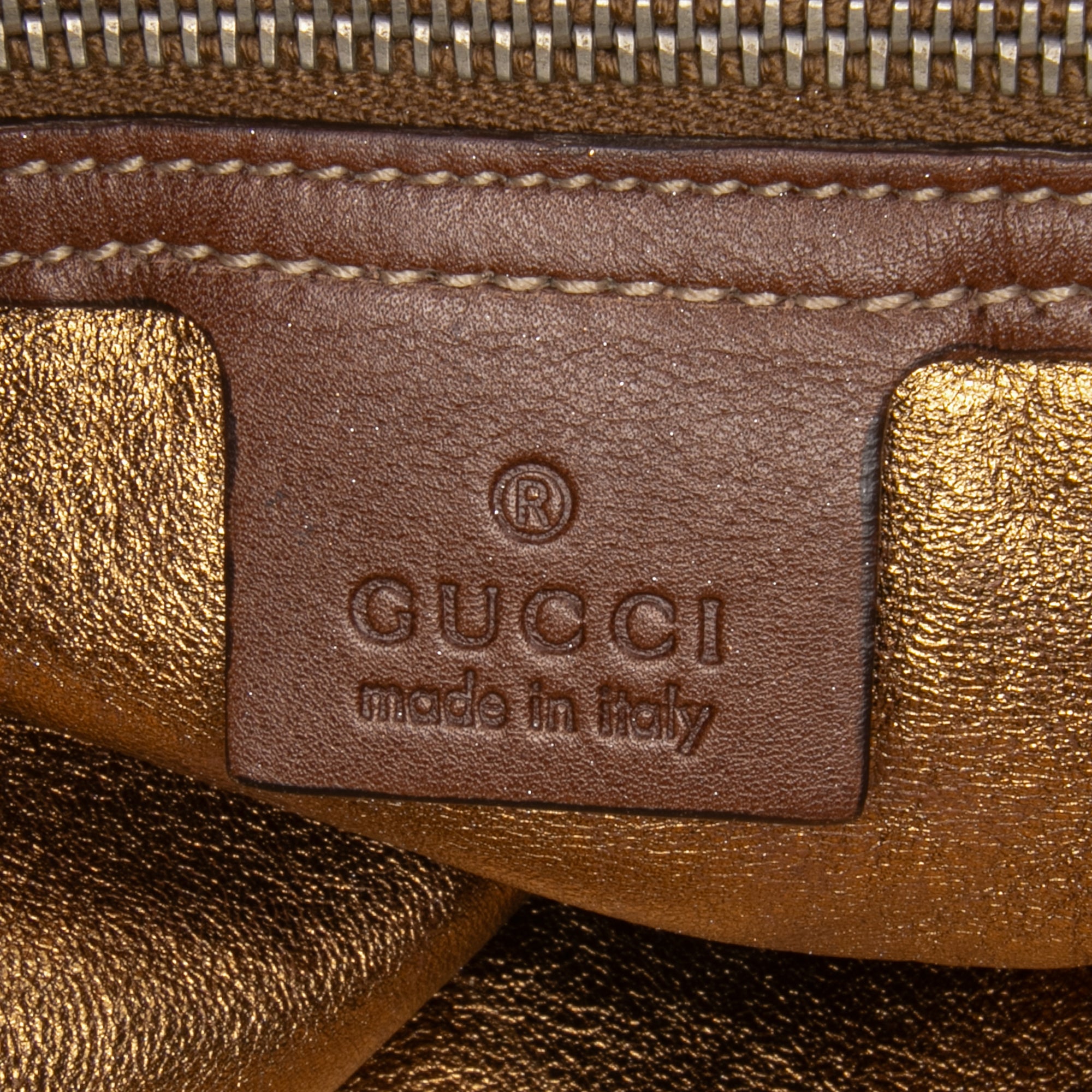 Large Crest Embossed Suede Indy Hobo