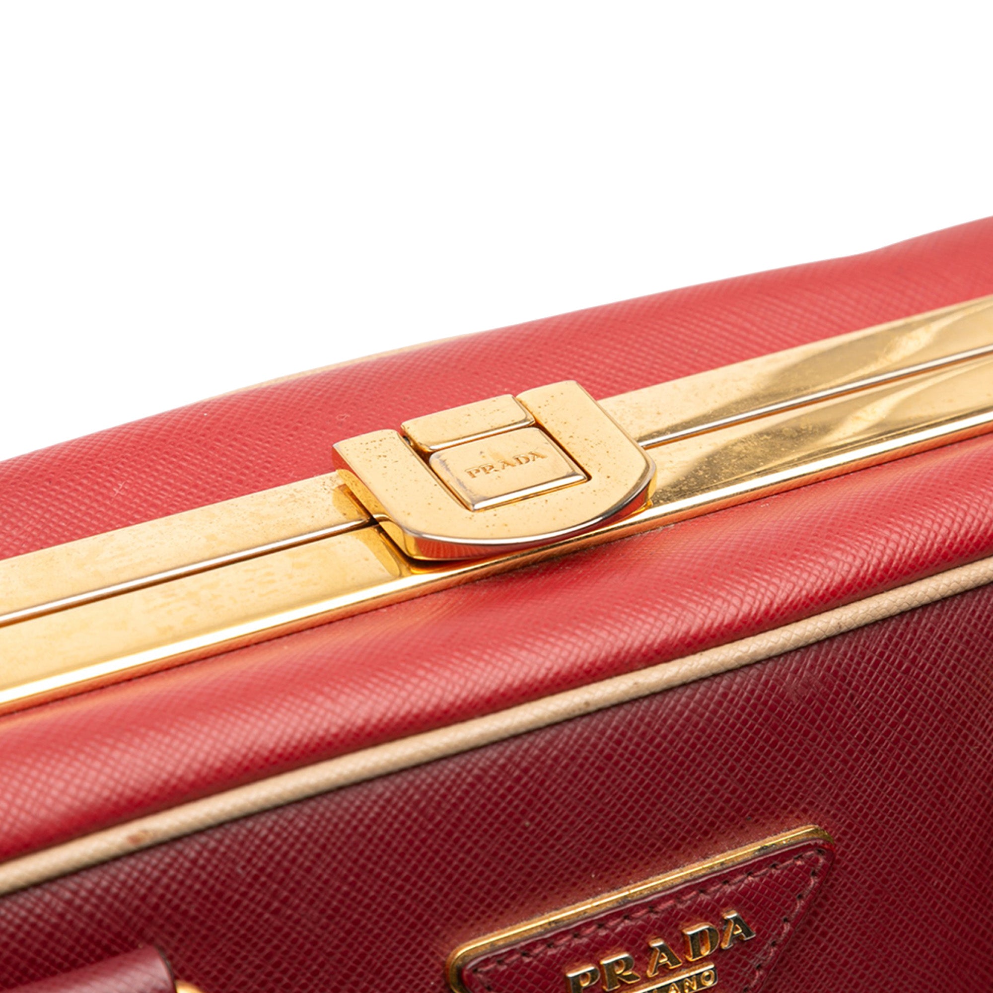 Saffiano Lux Pyramid Frame Top Handle Bag