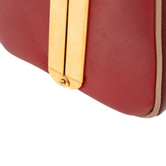 Saffiano Lux Pyramid Frame Top Handle Bag